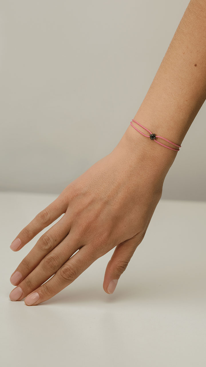 Bracelet cordon avec diamant central sertissage griffe Or 18k